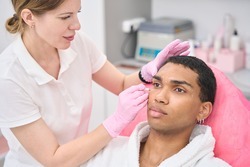 Man preparing for Microdermabrasion treatment
